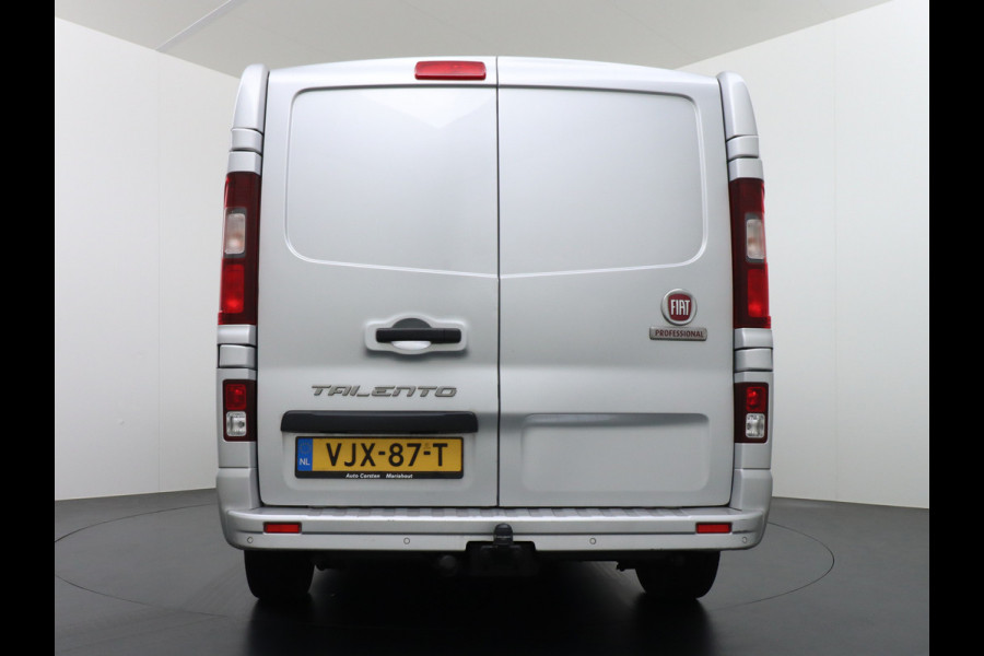 Fiat Talento 2.0D 146PK L2 D.C. 17" Pdc Trekh. Alles in kleur gespoten Led Airco Cruise Business Pro Dubbele Cabine 5-Pers. DC Led Betonplex-vloer Lat om Lat Privacy Glas Bluetooth Lengte 2 dus wél fatsoenlijke beenruimte achterin! 1e Eigenaar 2.000 kg trekvermogen Euro 6