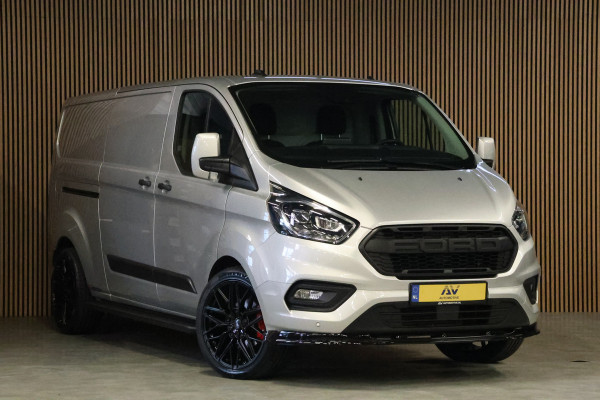 Ford Transit Custom 320 2.0 TDCI L2H1 Raptor Edition | Bi-Xenon | CarPlay | Navigatie | Camera | Stoelverwarming | Dodehoek detector | Lane Assist | DAB | Werkplaatsinrichting | 3-Zitter | Dealer onderhouden | Nieuwe APK