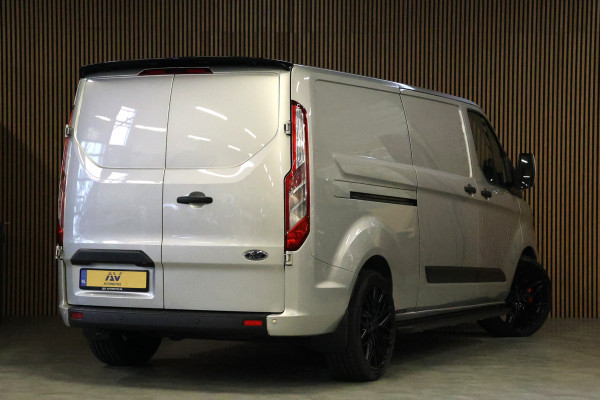 Ford Transit Custom 320 2.0 TDCI L2H1 Raptor Edition | Bi-Xenon | CarPlay | Navigatie | Camera | Stoelverwarming | Dodehoek detector | Lane Assist | DAB | Werkplaatsinrichting | 3-Zitter | Dealer onderhouden | Nieuwe APK