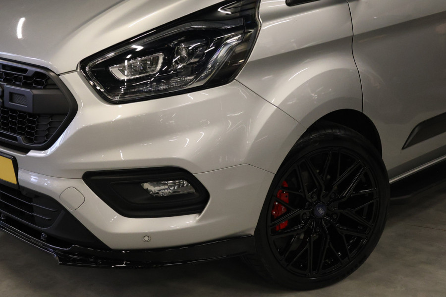 Ford Transit Custom 320 2.0 TDCI L2H1 Raptor Edition | Bi-Xenon | CarPlay | Navigatie | Camera | Stoelverwarming | Dodehoek detector | Lane Assist | DAB | Werkplaatsinrichting | 3-Zitter | Dealer onderhouden | Nieuwe APK