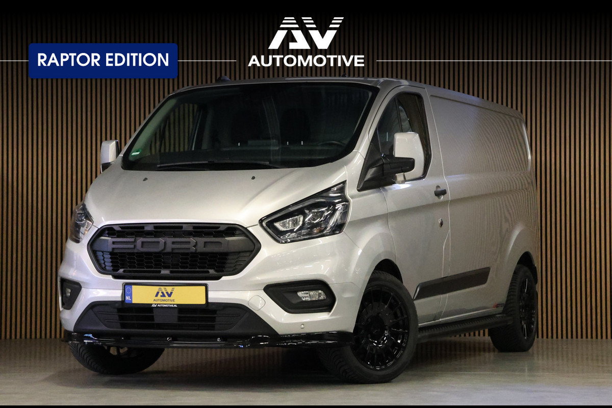 Ford Transit Custom 300 2.0 TDCI L2H1 | Raptor Edition | CarPlay | Camera | Cruise control | 3-Zitter | Airco | Trekhaak | NAP Logisch | Dealer onderhouden | Nieuwe APK Ford Transit Custom 300 2.0 TDCI L2H1 | Raptor Edition | CarPlay | Camera | Cruise control | 3-Zitter | Airco | Trekhaak | NAP Logisch | Dealer onderhouden | Nieuwe APK