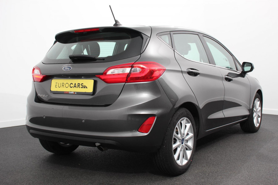 Ford Fiesta 1.0 EcoBoost 125pk Titanium | Navigatie | Apple Carplay/Android Auto | Parkeersensor achter | Cruise Control | Stoel-en stuurverwarming | Verwarmde voorruit | Climate Control