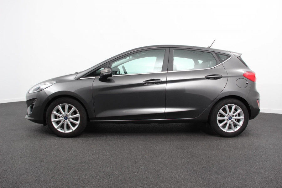 Ford Fiesta 1.0 EcoBoost 125pk Titanium | Navigatie | Apple Carplay/Android Auto | Parkeersensor achter | Cruise Control | Stoel-en stuurverwarming | Verwarmde voorruit | Climate Control