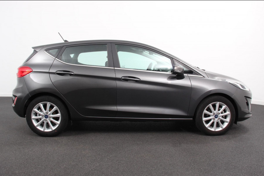 Ford Fiesta 1.0 EcoBoost 125pk Titanium | Navigatie | Apple Carplay/Android Auto | Parkeersensor achter | Cruise Control | Stoel-en stuurverwarming | Verwarmde voorruit | Climate Control