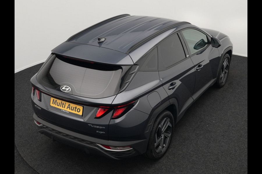 Hyundai Tucson 1.6 T-GDI Comfort 4WD 265pk Plug In Hybrid Dealer O.H. PHEV | Sportstoelen Verwarmd | Navigatie | Camera | Apple Carplay | DAB | L.M. 19" | Climate Control | Virtual |