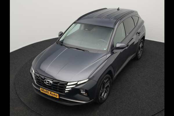 Hyundai Tucson 1.6 T-GDI Comfort 4WD 265pk Plug In Hybrid Dealer O.H. PHEV | Sportstoelen Verwarmd | Navigatie | Camera | Apple Carplay | DAB | L.M. 19" | Climate Control | Virtual |