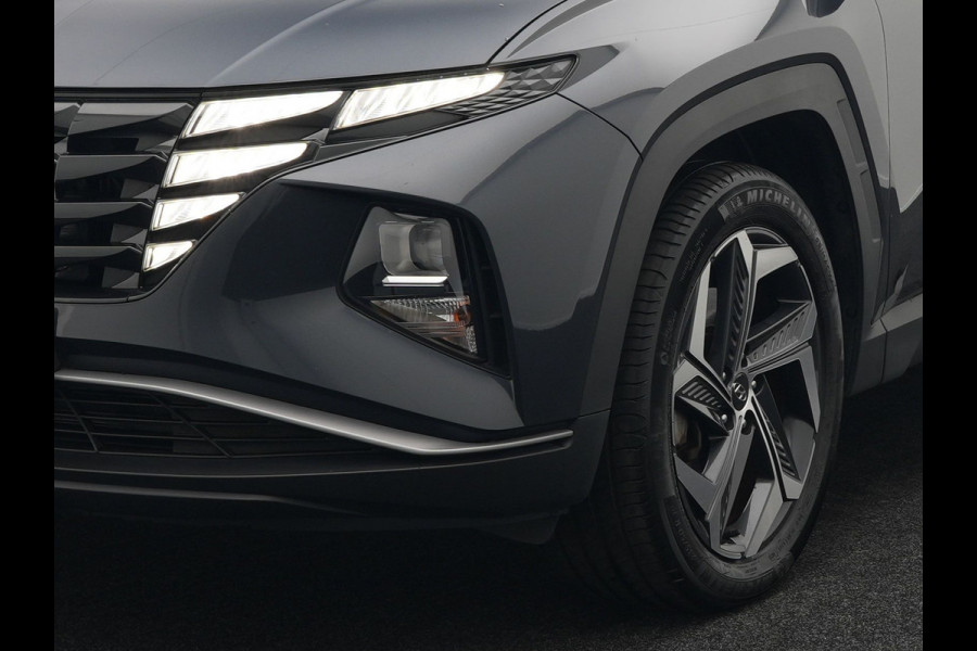 Hyundai Tucson 1.6 T-GDI Comfort 4WD 265pk Plug In Hybrid Dealer O.H. PHEV | Sportstoelen Verwarmd | Navigatie | Camera | Apple Carplay | DAB | L.M. 19" | Climate Control | Virtual |