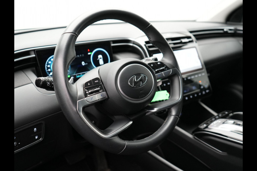Hyundai Tucson 1.6 T-GDI Comfort 4WD 265pk Plug In Hybrid Dealer O.H. PHEV | Sportstoelen Verwarmd | Navigatie | Camera | Apple Carplay | DAB | L.M. 19" | Climate Control | Virtual |