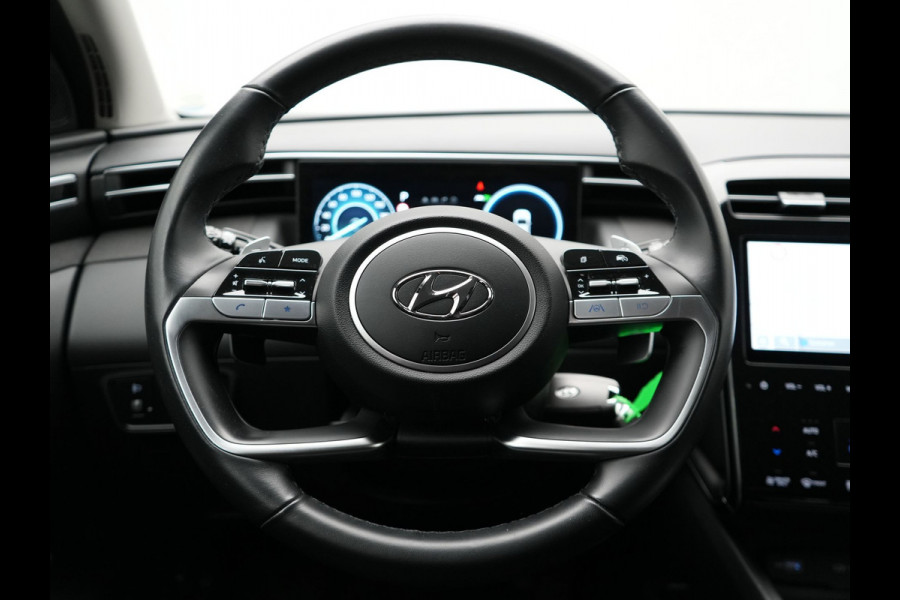 Hyundai Tucson 1.6 T-GDI Comfort 4WD 265pk Plug In Hybrid Dealer O.H. PHEV | Sportstoelen Verwarmd | Navigatie | Camera | Apple Carplay | DAB | L.M. 19" | Climate Control | Virtual |