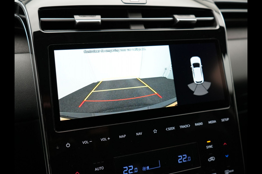 Hyundai Tucson 1.6 T-GDI Comfort 4WD 265pk Plug In Hybrid Dealer O.H. PHEV | Sportstoelen Verwarmd | Navigatie | Camera | Apple Carplay | DAB | L.M. 19" | Climate Control | Virtual |