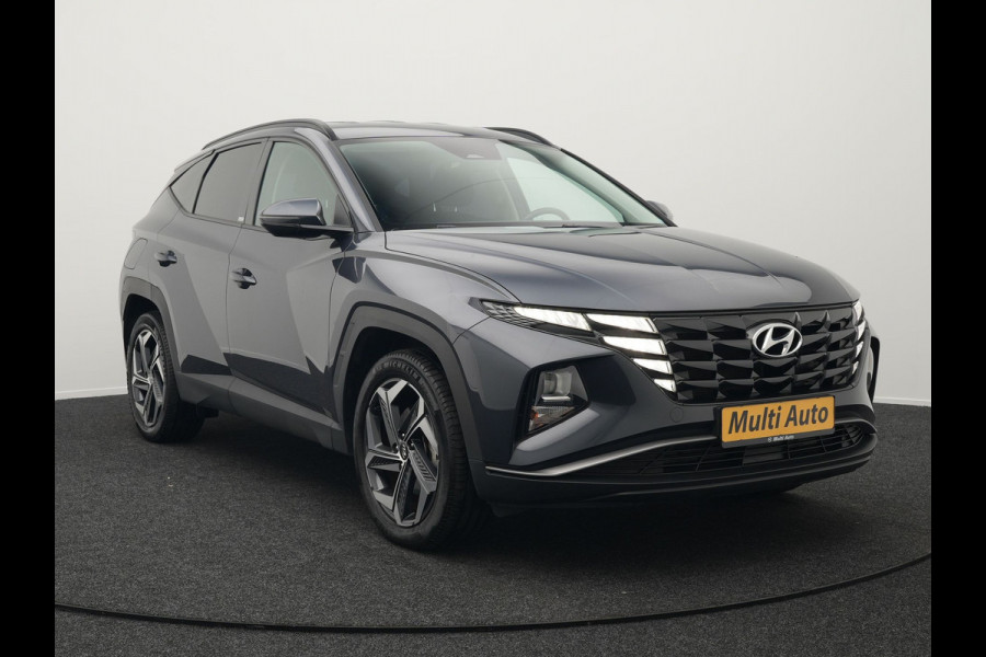 Hyundai Tucson 1.6 T-GDI Comfort 4WD 265pk Plug In Hybrid Dealer O.H. PHEV | Sportstoelen Verwarmd | Navigatie | Camera | Apple Carplay | DAB | L.M. 19" | Climate Control | Virtual |