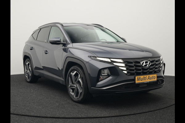 Hyundai Tucson 1.6 T-GDI Comfort 4WD 265pk Plug In Hybrid Dealer O.H. PHEV | Sportstoelen Verwarmd | Navigatie | Camera | Apple Carplay | DAB | L.M. 19" | Climate Control | Virtual |