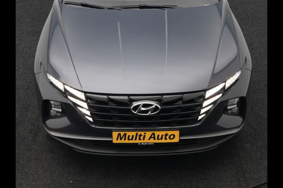 Hyundai Tucson 1.6 T-GDI Comfort 4WD 265pk Plug In Hybrid Dealer O.H. PHEV | Sportstoelen Verwarmd | Navigatie | Camera | Apple Carplay | DAB | L.M. 19" | Climate Control | Virtual |