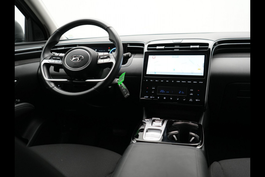 Hyundai Tucson 1.6 T-GDI Comfort 4WD 265pk Plug In Hybrid Dealer O.H. PHEV | Sportstoelen Verwarmd | Navigatie | Camera | Apple Carplay | DAB | L.M. 19" | Climate Control | Virtual |
