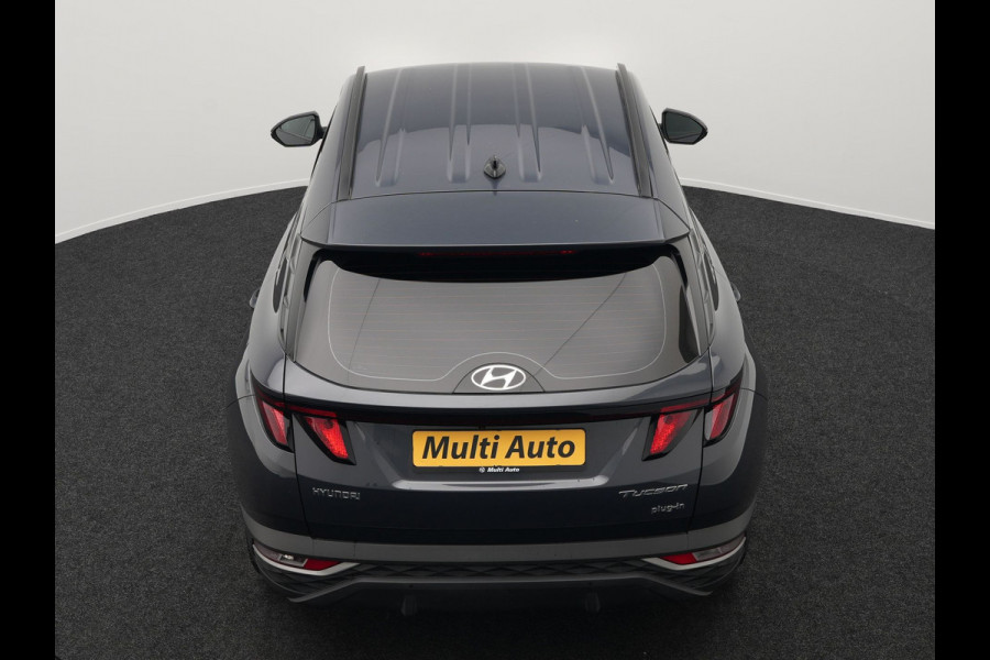 Hyundai Tucson 1.6 T-GDI Comfort 4WD 265pk Plug In Hybrid Dealer O.H. PHEV | Sportstoelen Verwarmd | Navigatie | Camera | Apple Carplay | DAB | L.M. 19" | Climate Control | Virtual |