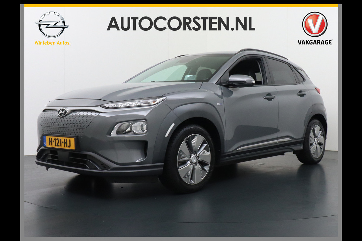 Hyundai Kona EV 64kWh Stoelverwarming Apple Carplay Android Auto Navi Ecc Adap.Cruise Head-Up Display Camera DAB PDC Fashion Design-Pack Keyless Bluelink Led Regen-Lichtsensor Dodehoek-assistent Rijstrooksensor 1e Eigenaar, 449km WLTP actieradius Heerlijke sterke en efficiënte EV met grote accu! Hyundai Kona EV 64kWh Stoelverwarming Apple Carplay Android Auto Navi Ecc Adap.Cruise Head-Up Display Camera DAB PDC Fashion Design-Pack Keyless Bluelink Led Regen-Lichtsensor Dodehoek-assistent Rijstrooksensor 1e Eigenaar, 449km WLTP actieradius Heerlijke sterke en efficiënte EV met grote accu!