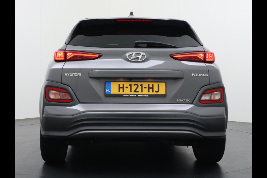 Hyundai Kona EV 64kWh Stoelverwarming Apple Carplay Android Auto Navi Ecc Adap.Cruise Head-Up Display Camera DAB PDC Fashion Design-Pack Keyless Bluelink Led Regen-Lichtsensor Dodehoek-assistent Rijstrooksensor 1e Eigenaar, 449km WLTP actieradius Heerlijke sterke en efficiënte EV met grote accu!