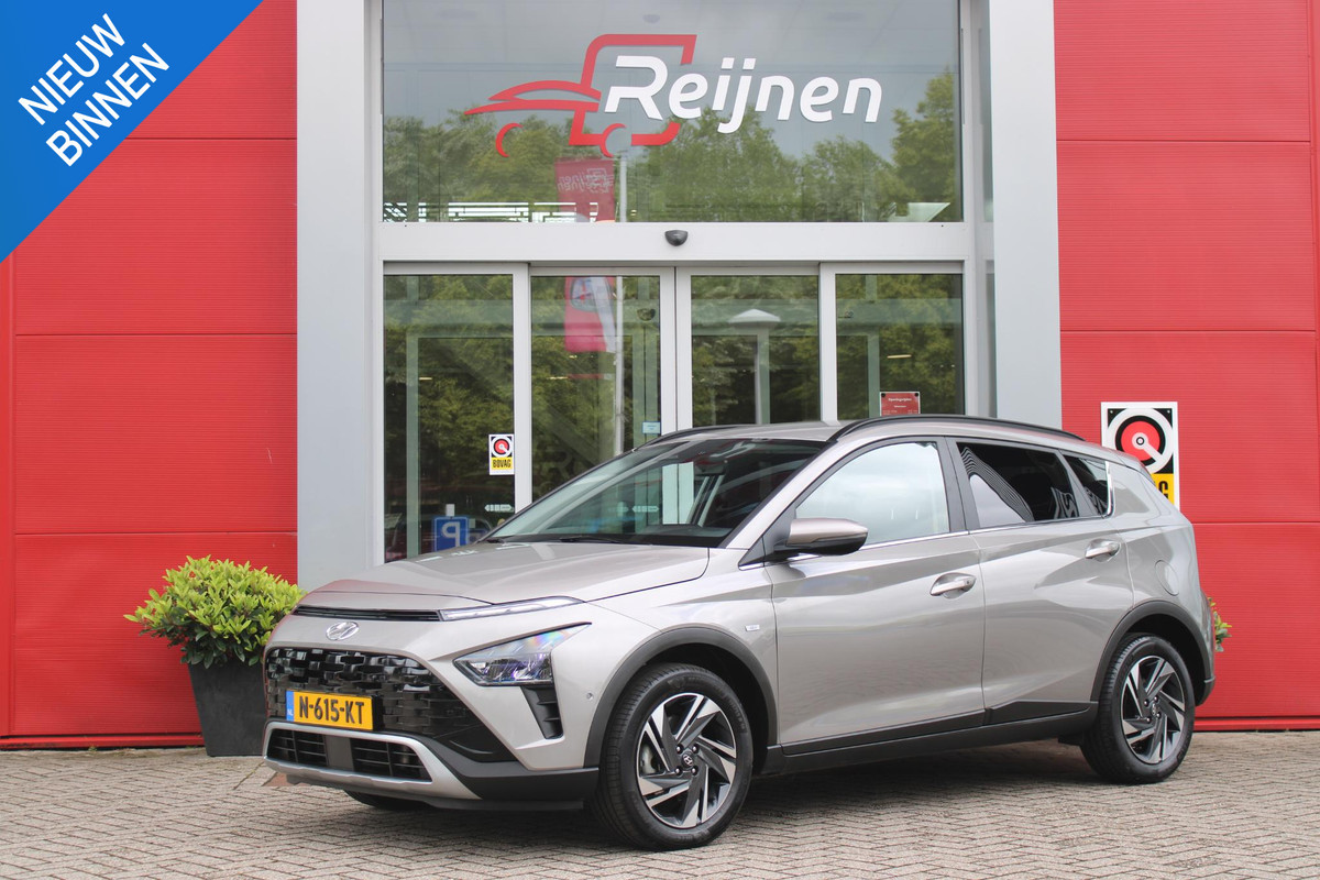 Hyundai Bayon 1.0 T-GDI 100PK AUTOMAAT PREMIUM | ACHTERUITRIJ CAMERA | CLIMATE CONTROL | SFEER VERLICHTING | LED KOPLAMPEN | BOSE AUDIO | STOEL/STUUR VERWARMING | DODEHOEK DETECTIE | KEYLESS ENTRY/START | PARKEERSENSOREN VOOR EN ACHER | APPLE CARPLAY/ANDROID AUTO | DRAADLOZE TEEFOONLADER |
