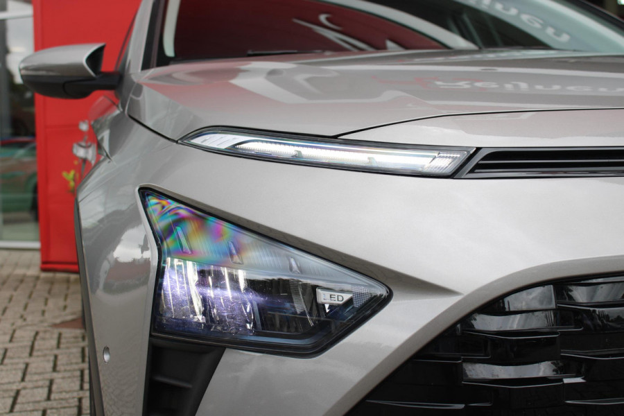 Hyundai Bayon 1.0 T-GDI 100PK AUTOMAAT PREMIUM | ACHTERUITRIJ CAMERA | CLIMATE CONTROL | SFEER VERLICHTING | LED KOPLAMPEN | BOSE AUDIO | STOEL/STUUR VERWARMING | DODEHOEK DETECTIE | KEYLESS ENTRY/START | PARKEERSENSOREN VOOR EN ACHER | APPLE CARPLAY/ANDROID AUTO | DRAADLOZE TEEFOONLADER |