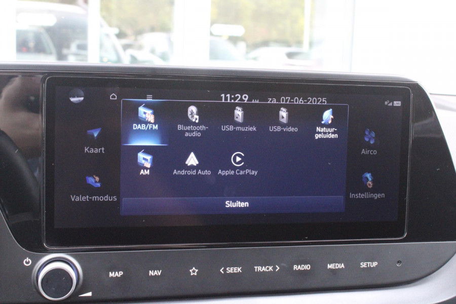 Hyundai Bayon 1.0 T-GDI 100PK AUTOMAAT PREMIUM | ACHTERUITRIJ CAMERA | CLIMATE CONTROL | SFEER VERLICHTING | LED KOPLAMPEN | BOSE AUDIO | STOEL/STUUR VERWARMING | DODEHOEK DETECTIE | KEYLESS ENTRY/START | PARKEERSENSOREN VOOR EN ACHER | APPLE CARPLAY/ANDROID AUTO | DRAADLOZE TEEFOONLADER |
