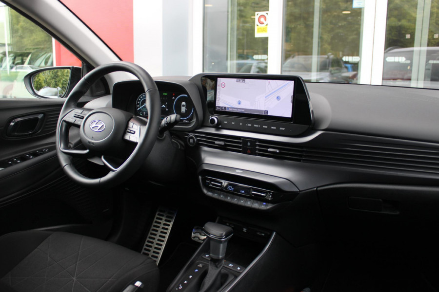 Hyundai Bayon 1.0 T-GDI 100PK AUTOMAAT PREMIUM | ACHTERUITRIJ CAMERA | CLIMATE CONTROL | SFEER VERLICHTING | LED KOPLAMPEN | BOSE AUDIO | STOEL/STUUR VERWARMING | DODEHOEK DETECTIE | KEYLESS ENTRY/START | PARKEERSENSOREN VOOR EN ACHER | APPLE CARPLAY/ANDROID AUTO | DRAADLOZE TEEFOONLADER |