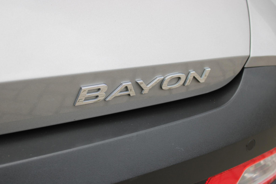 Hyundai Bayon 1.0 T-GDI 100PK AUTOMAAT PREMIUM | ACHTERUITRIJ CAMERA | CLIMATE CONTROL | SFEER VERLICHTING | LED KOPLAMPEN | BOSE AUDIO | STOEL/STUUR VERWARMING | DODEHOEK DETECTIE | KEYLESS ENTRY/START | PARKEERSENSOREN VOOR EN ACHER | APPLE CARPLAY/ANDROID AUTO | DRAADLOZE TEEFOONLADER |