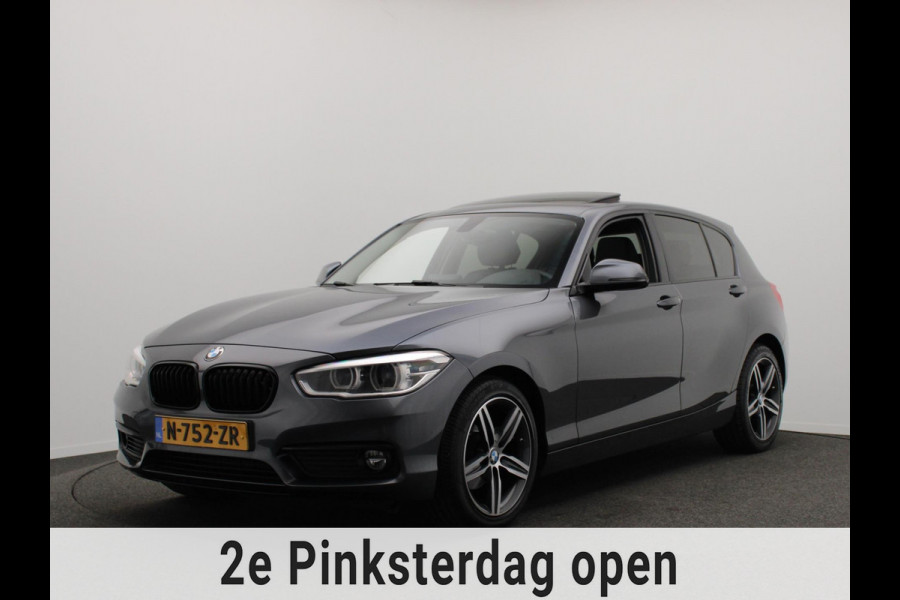 BMW 1-serie 118i High Executive * Trekhaak * Panoramadak Leder Stoelverwarming
