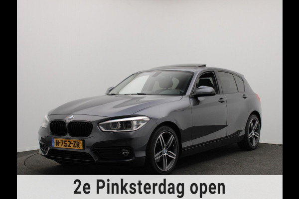 BMW 1-serie 118i High Executive * Trekhaak * Panoramadak Leder Stoelverwarming