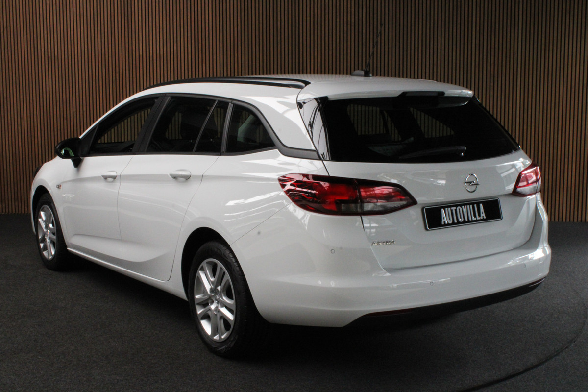 Opel Astra Sports Tourer 1.4 T Aut Navi Stoel- & stuurverw. Airco Carplay PDC Bluetooth Cruise BTW auto Opel Astra Sports Tourer 1.4 T Aut Navi Stoel- & stuurverw. Airco Carplay PDC Bluetooth Cruise BTW auto