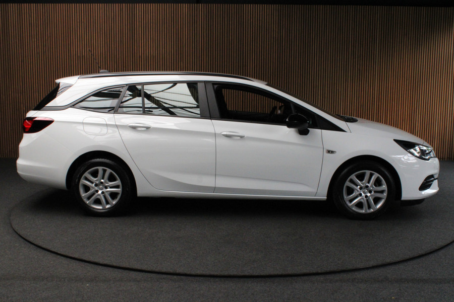 Opel Astra Sports Tourer 1.4 T Aut Navi Stoel- & stuurverw. Airco Carplay PDC Bluetooth Cruise BTW auto