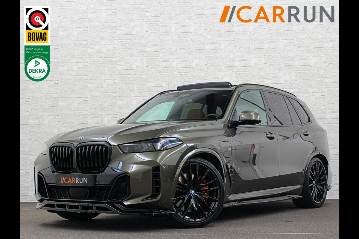 BMW X5 50e 490pk M-Pro Individual | ACC | 360 | Carbon | Stoelventilatie | 22" | Softclose | TH | Panodak | Comfort Seats | Driving Prof. | Park Prof. | Comfort plus | Manhattan met Tartufo Merino! Fabr. Gar. 06-2027 | NL-Auto | BTW. BMW X5 50e 490pk M-Pro Individual | ACC | 360 | Carbon | Stoelventilatie | 22" | Softclose | TH | Panodak | Comfort Seats | Driving Prof. | Park Prof. | Comfort plus | Manhattan met Tartufo Merino! Fabr. Gar. 06-2027 | NL-Auto | BTW.