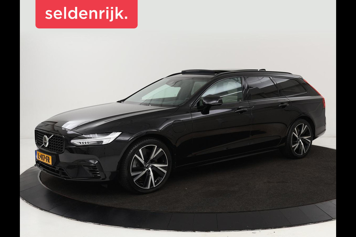 Volvo V90 2.0 T8 AWD R-Design | Panoramadak | Head-Up | Trekhaak | Stoel & stuurverwarming | Leder | 360 camera | Luchtvering | Harman/Kardon | Adaptive cruise | Achterbankverwarming Volvo V90 2.0 T8 AWD R-Design | Panoramadak | Head-Up | Trekhaak | Stoel & stuurverwarming | Leder | 360 camera | Luchtvering | Harman/Kardon | Adaptive cruise | Achterbankverwarming