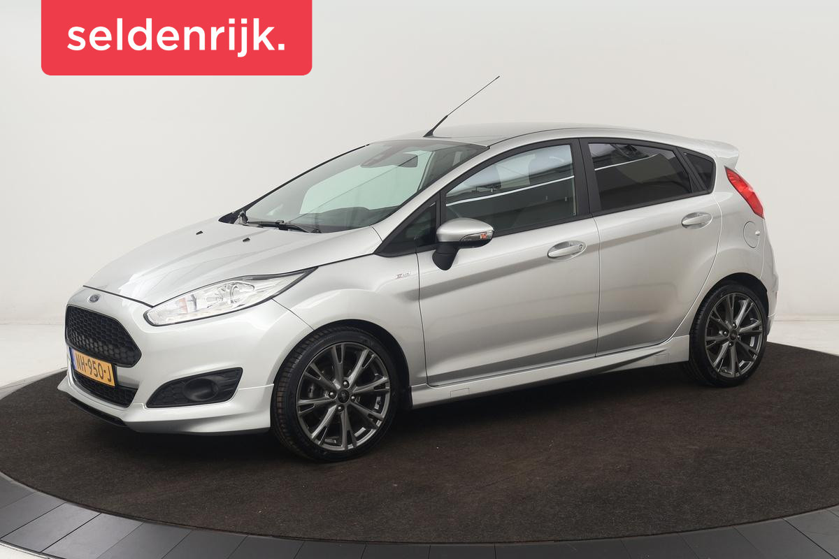 Ford Fiesta 1.0 EcoBoost ST Line | Navigatie | Climate control | Parkeerhulp | Cruise control | Verwarmde voorruit | Bluetooth Ford Fiesta 1.0 EcoBoost ST Line | Navigatie | Climate control | Parkeerhulp | Cruise control | Verwarmde voorruit | Bluetooth