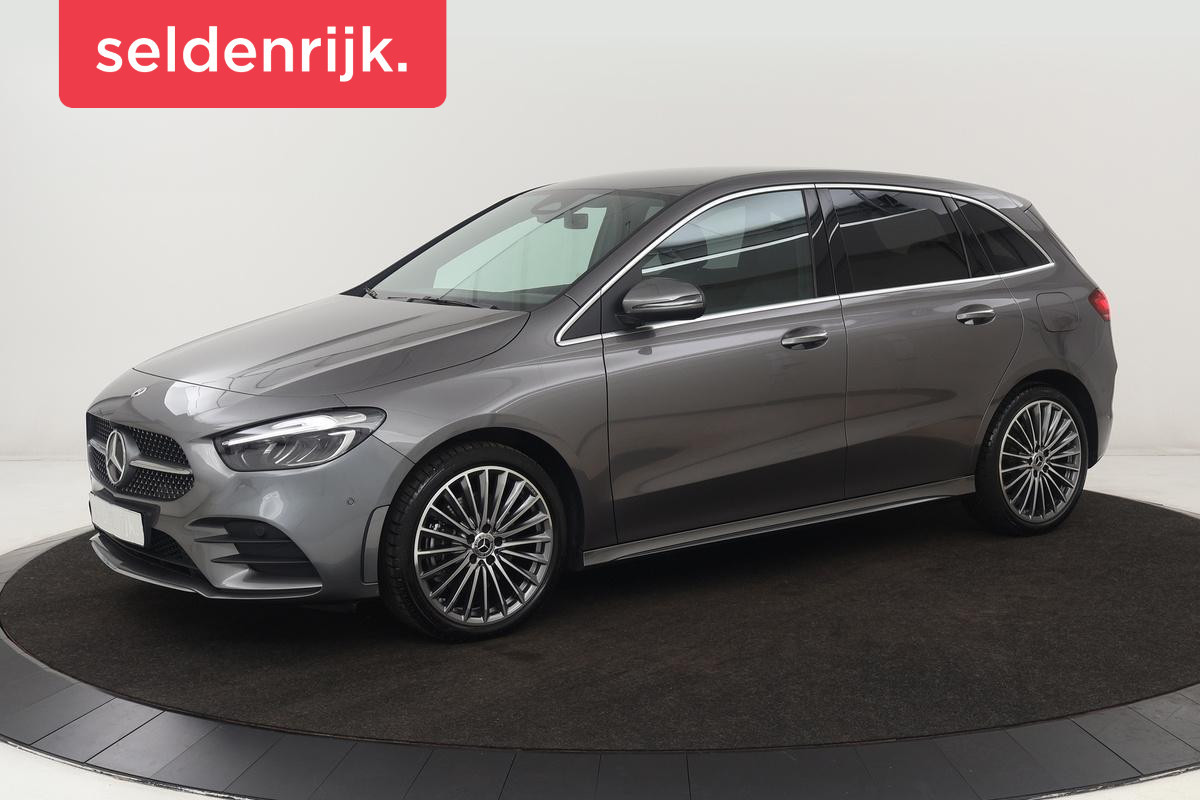 Mercedes-Benz B-Klasse 250e AMG | Stoelverwarming | Camera | Sfeerverlichting | Keyless | Leder/Alcantara | Navigatie | Widescreen | Full LED | Park Assist Mercedes-Benz B-Klasse 250e AMG | Stoelverwarming | Camera | Sfeerverlichting | Keyless | Leder/Alcantara | Navigatie | Widescreen | Full LED | Park Assist