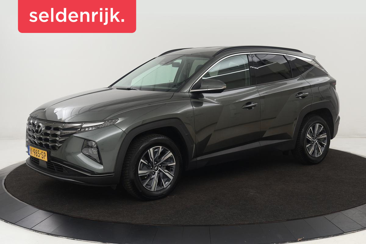 Hyundai Tucson 1.6 T-GDI HEV Comfort Smart | Trekhaak | Stoel & stuurverwarming | Adaptive cruise | Carplay | Camera | Navigatie | Keyless Hyundai Tucson 1.6 T-GDI HEV Comfort Smart | Trekhaak | Stoel & stuurverwarming | Adaptive cruise | Carplay | Camera | Navigatie | Keyless