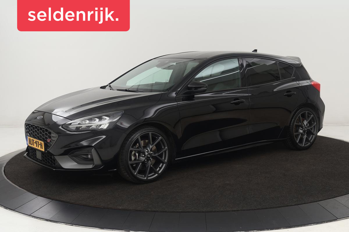 Ford Focus 2.3 EcoBoost ST-3 | Stoel & stuurverwarming | B&O Sound | Recaro Sportstoelen | Carplay | Full LED | Navigatie | Half leder Ford Focus 2.3 EcoBoost ST-3 | Stoel & stuurverwarming | B&O Sound | Recaro Sportstoelen | Carplay | Full LED | Navigatie | Half leder