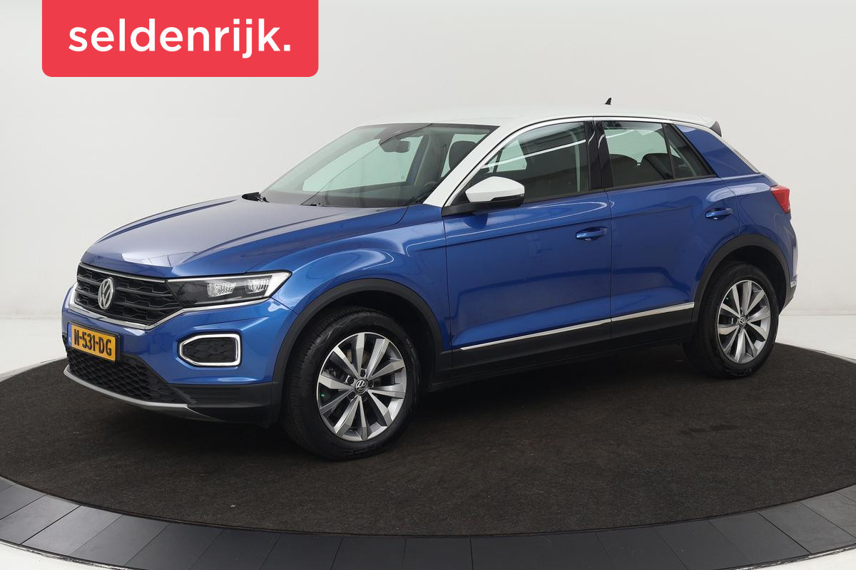 Volkswagen T-Roc 1.5 TSI Sport | Stoelverwarming | Full LED | Trekhaak | Navigatie | Climate control | PDC | Sportstoelen | Cruise control | Bluetooth Volkswagen T-Roc 1.5 TSI Sport | Stoelverwarming | Full LED | Trekhaak | Navigatie | Climate control | PDC | Sportstoelen | Cruise control | Bluetooth