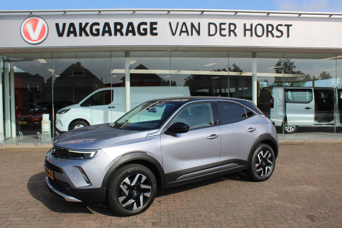 Opel Mokka 1.2-101pk 'Elegance'. Werkelijk in nieuwstaat verkerende nieuwste model Opel Mokka ! Volautm. airco, navigatie, Isofix, telefoonvoorb., metallic lak, LM wielen, digitaal dashboard etc., etc. Opel Mokka 1.2-101pk 'Elegance'. Werkelijk in nieuwstaat verkerende nieuwste model Opel Mokka ! Volautm. airco, navigatie, Isofix, telefoonvoorb., metallic lak, LM wielen, digitaal dashboard etc., etc.