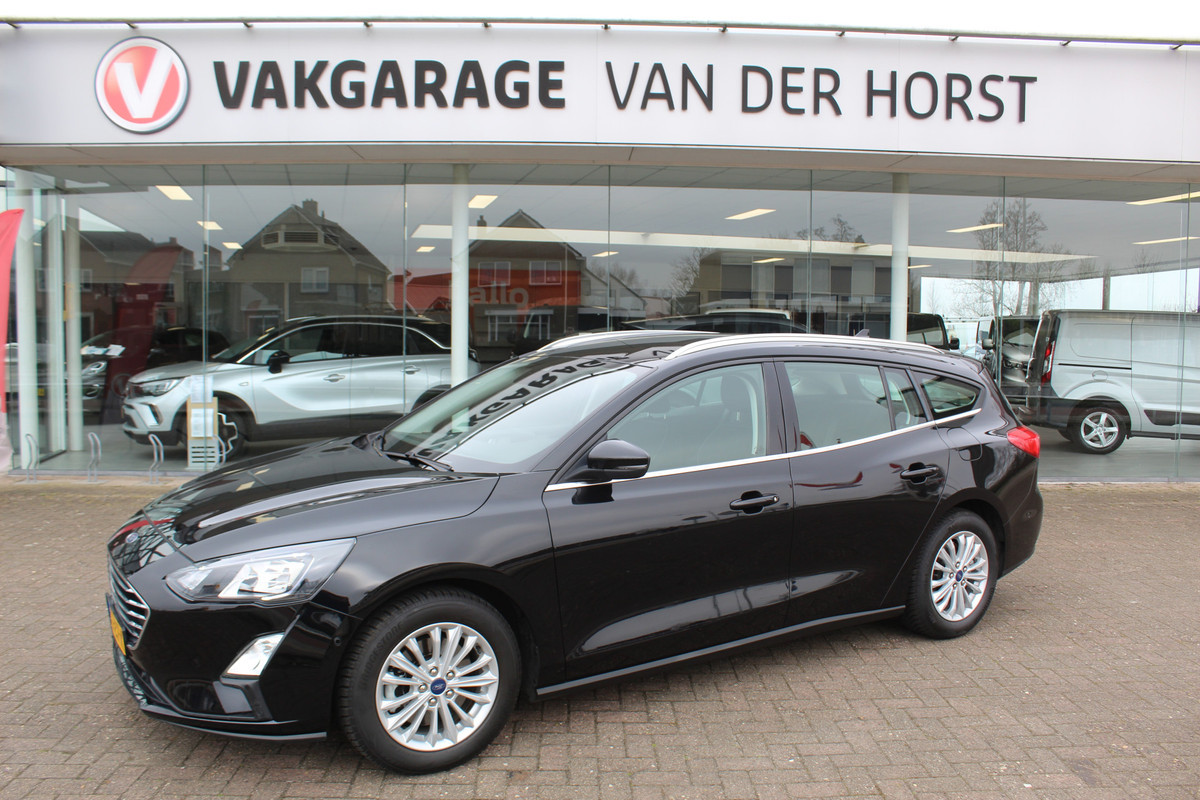 Ford FOCUS Wagon 1.0-125pk EcoBoost Mild-hybrid Titanium. Mooie, ruime, luxe en comfortabele Ford Focus wagon ! Volautm. airco dual, camera, stoel-, stuur- en voorraamverw., easy entry/easy go, cruise control, Isofix, side- en lane assist, parkeersensoren v+a, LM wielen etc. Ford FOCUS Wagon 1.0-125pk EcoBoost Mild-hybrid Titanium. Mooie, ruime, luxe en comfortabele Ford Focus wagon ! Volautm. airco dual, camera, stoel-, stuur- en voorraamverw., easy entry/easy go, cruise control, Isofix, side- en lane assist, parkeersensoren v+a, LM wielen etc.