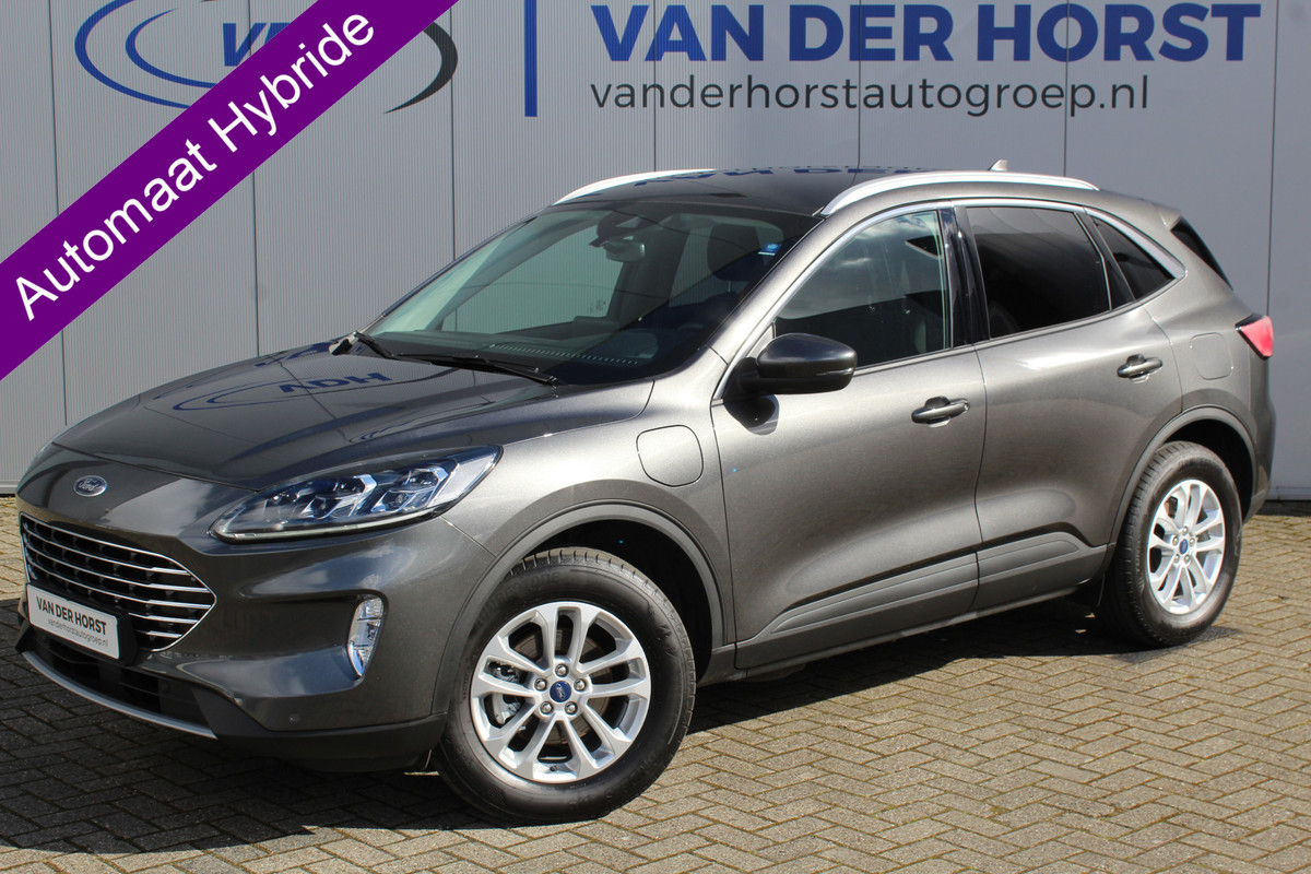 Ford Kuga 2.5-225pk PHEV Titanium X Plug-In Hybrid. Fabr. garantie t/m 07-04-2028 ! Slechts 10.000km ! Autm. airco dual, stoel-, stuur- en voorraamverw., LED verl., B&O soundsyst., metallic lak, cruise control, camera, LM wielen, elektr. achterklep en best. stoel etc. Ford Kuga 2.5-225pk PHEV Titanium X Plug-In Hybrid. Fabr. garantie t/m 07-04-2028 ! Slechts 10.000km ! Autm. airco dual, stoel-, stuur- en voorraamverw., LED verl., B&O soundsyst., metallic lak, cruise control, camera, LM wielen, elektr. achterklep en best. stoel etc.