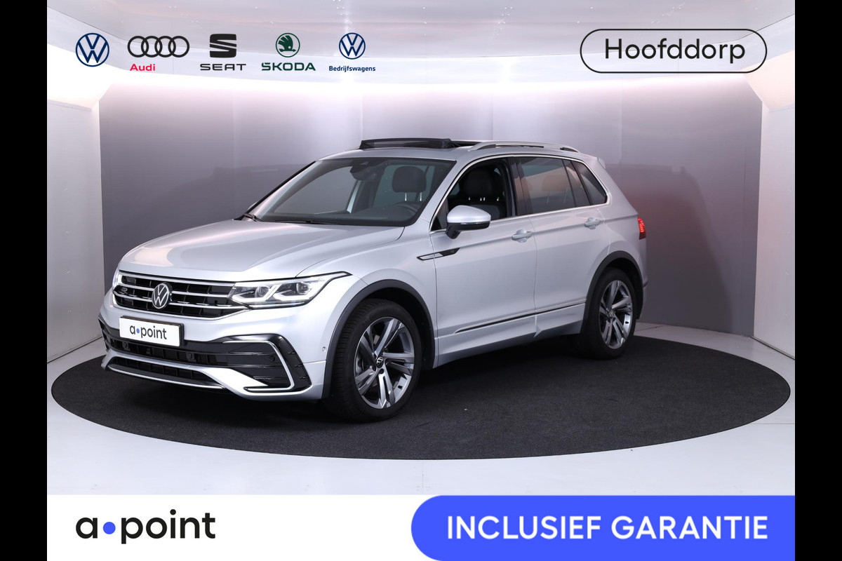 Volkswagen Tiguan 1.5 TSI R-Line Business 150 pk Automaat (DSG) | Verlengde garantie | Navigatie | Panoramadak | Elektr. trekhaak | Parkeersensoren (Park assist) | Achteruitrijcamera | R-Line | Volkswagen Tiguan 1.5 TSI R-Line Business 150 pk Automaat (DSG) | Verlengde garantie | Navigatie | Panoramadak | Elektr. trekhaak | Parkeersensoren (Park assist) | Achteruitrijcamera | R-Line |