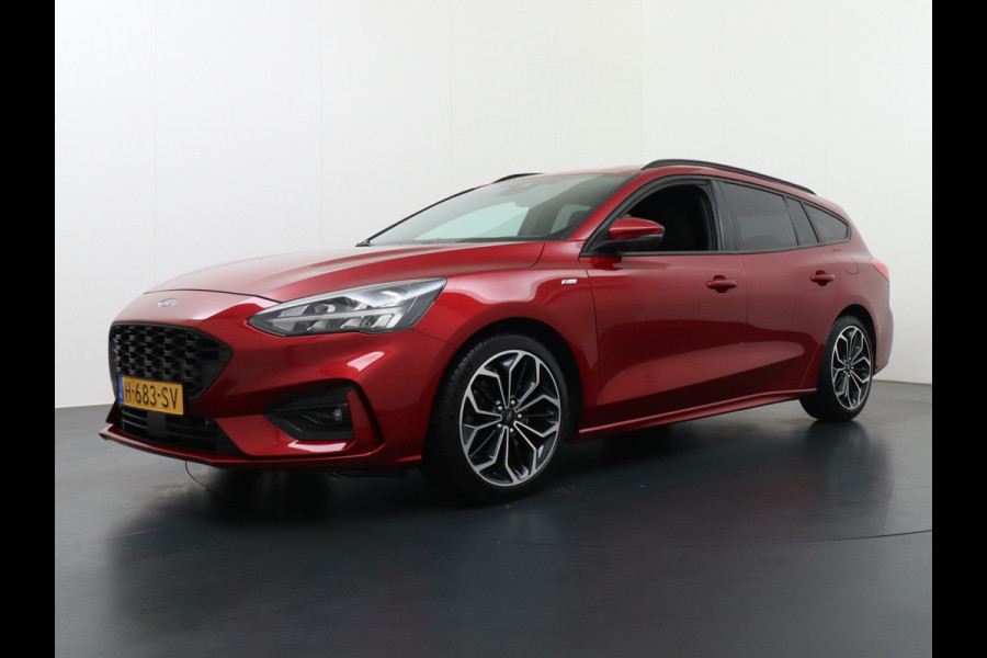 Ford FOCUS Wagon 1.0T 126PK ST Line 18" Navi Apple Carplay Android Auto Ecc Trekhaak Design Pack 2 Stuur+Stoel+Voorruit Verwarming Cruise Control EcoBoost Winter Pack Keyless Led Comfort Pack Lmv  Privacy Glas Licht-Regensensor Wifi Bluetooth Rijstrooksensor 1e Eigenaar 1.383KG