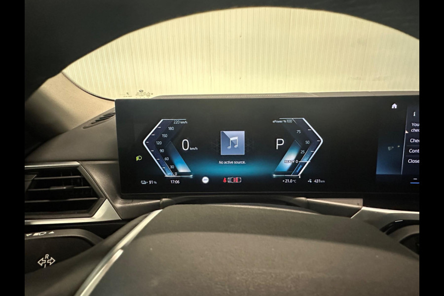 BMW i4 EDrive40 84 kWh | ACHTERUITRIJCAMERA | ZWART HEMELDAK BLACK EDITION | FULL OPTIONS