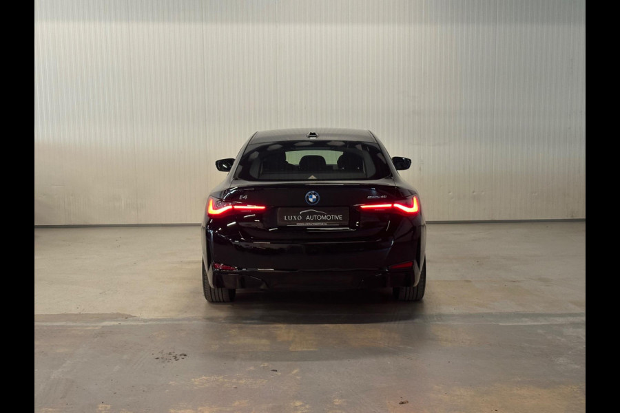 BMW i4 EDrive40 84 kWh | ACHTERUITRIJCAMERA | ZWART HEMELDAK BLACK EDITION | FULL OPTIONS