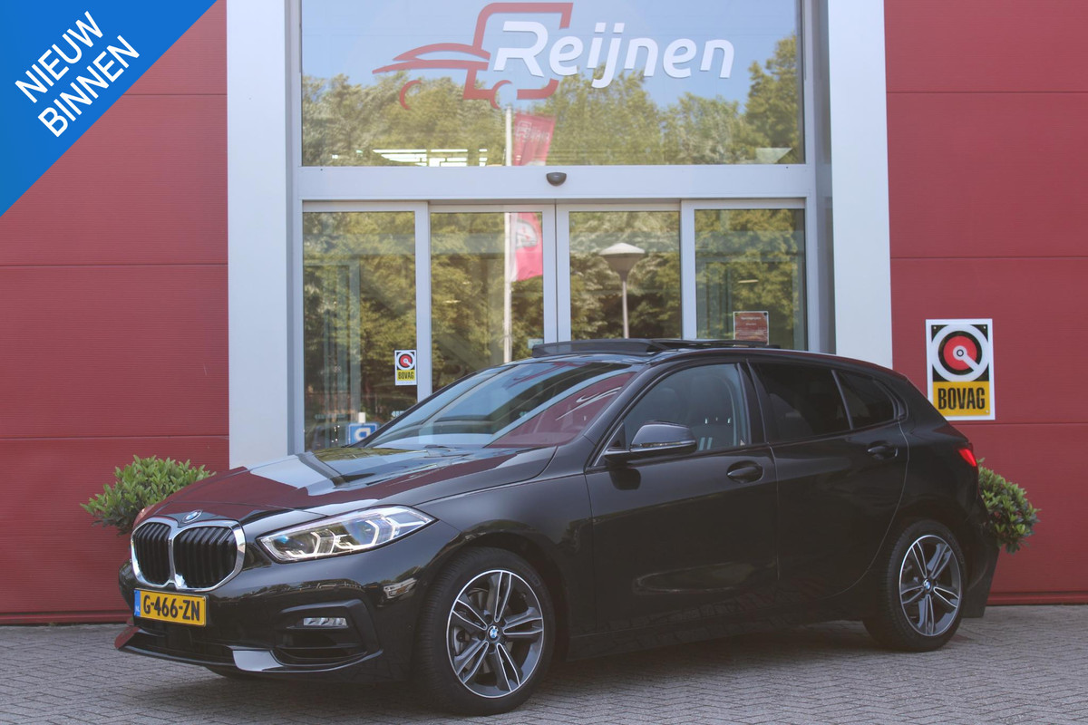 BMW 1-serie 118i 140PK AUTOMAAT EXECUTIVE EDITION | PANORAMISCH SCHUIF/KANTELKDAK | AFNEEMBARE TREKHAAK | DRAADLOZE TELEFOONLADER | DRAADLOZE APPLE CARPLAY/ANDROID AUTO | NAVIGATIE | ACHTERUITRIJ CAMERA | PARKEERSENSOREN VOOR EN ACHTER | CRUISE CONTROL | FULL LED KOPLAMPEN | CLIMATE CONTROL | ALL SEASON BANDEN | 17" LICHTMETALEN VELGEN | BMW 1-serie 118i 140PK AUTOMAAT EXECUTIVE EDITION | PANORAMISCH SCHUIF/KANTELKDAK | AFNEEMBARE TREKHAAK | DRAADLOZE TELEFOONLADER | DRAADLOZE APPLE CARPLAY/ANDROID AUTO | NAVIGATIE | ACHTERUITRIJ CAMERA | PARKEERSENSOREN VOOR EN ACHTER | CRUISE CONTROL | FULL LED KOPLAMPEN | CLIMATE CONTROL | ALL SEASON BANDEN | 17" LICHTMETALEN VELGEN |