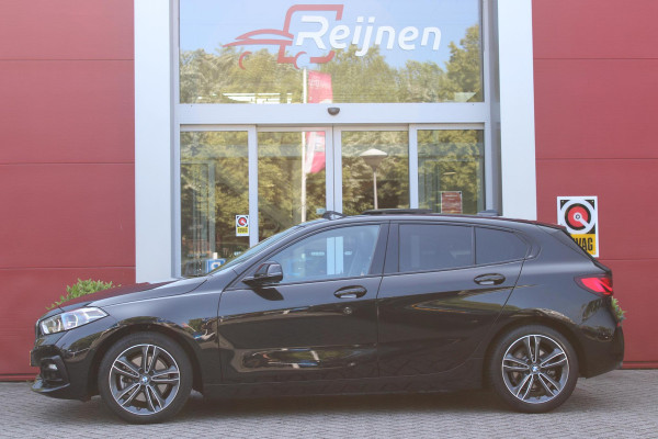 BMW 1-serie 118i 140PK AUTOMAAT EXECUTIVE EDITION | PANORAMISCH SCHUIF/KANTELKDAK | AFNEEMBARE TREKHAAK | DRAADLOZE TELEFOONLADER | DRAADLOZE APPLE CARPLAY/ANDROID AUTO | NAVIGATIE | ACHTERUITRIJ CAMERA | PARKEERSENSOREN VOOR EN ACHTER | CRUISE CONTROL | FULL LED KOPLAMPEN | CLIMATE CONTROL | ALL SEASON BANDEN | 17" LICHTMETALEN VELGEN |