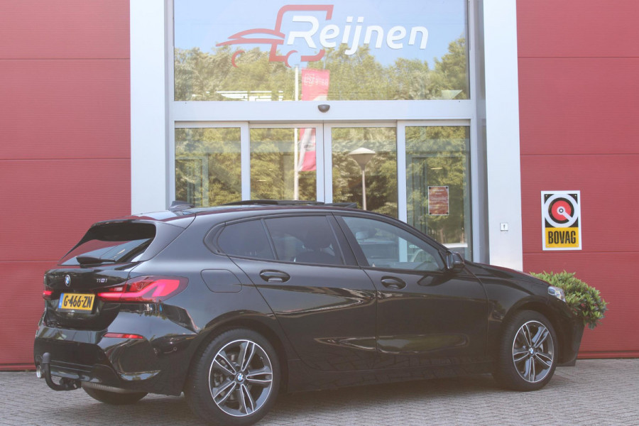 BMW 1-serie 118i 140PK AUTOMAAT EXECUTIVE EDITION | PANORAMISCH SCHUIF/KANTELKDAK | AFNEEMBARE TREKHAAK | DRAADLOZE TELEFOONLADER | DRAADLOZE APPLE CARPLAY/ANDROID AUTO | NAVIGATIE | ACHTERUITRIJ CAMERA | PARKEERSENSOREN VOOR EN ACHTER | CRUISE CONTROL | FULL LED KOPLAMPEN | CLIMATE CONTROL | ALL SEASON BANDEN | 17" LICHTMETALEN VELGEN |