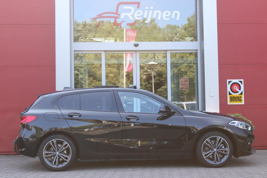 BMW 1-serie 118i 140PK AUTOMAAT EXECUTIVE EDITION | PANORAMISCH SCHUIF/KANTELKDAK | AFNEEMBARE TREKHAAK | DRAADLOZE TELEFOONLADER | DRAADLOZE APPLE CARPLAY/ANDROID AUTO | NAVIGATIE | ACHTERUITRIJ CAMERA | PARKEERSENSOREN VOOR EN ACHTER | CRUISE CONTROL | FULL LED KOPLAMPEN | CLIMATE CONTROL | ALL SEASON BANDEN | 17" LICHTMETALEN VELGEN |