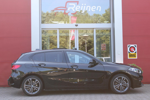 BMW 1-serie 118i 140PK AUTOMAAT EXECUTIVE EDITION | PANORAMISCH SCHUIF/KANTELKDAK | AFNEEMBARE TREKHAAK | DRAADLOZE TELEFOONLADER | DRAADLOZE APPLE CARPLAY/ANDROID AUTO | NAVIGATIE | ACHTERUITRIJ CAMERA | PARKEERSENSOREN VOOR EN ACHTER | CRUISE CONTROL | FULL LED KOPLAMPEN | CLIMATE CONTROL | ALL SEASON BANDEN | 17" LICHTMETALEN VELGEN |