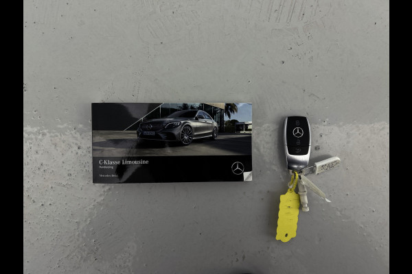 Mercedes-Benz C-Klasse 200 Business Solution AMG | Achteruitrijcamera | AMG-styling | Smartphone-integratiepakket | Navigatiesysteem full map | 24 Maanden Mercedes-Benz Certified garantie.